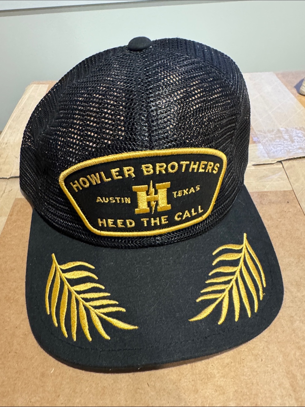 Howler Brothers Black Trucker Hat with Gold Embroidery